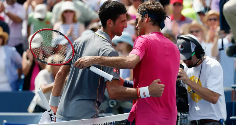 Novak Djokovic and Roger Federer trade pleasantaries after a final in Cincinnati