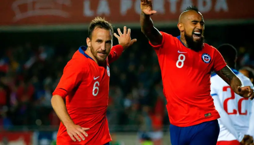 Chile players celebrate a goal